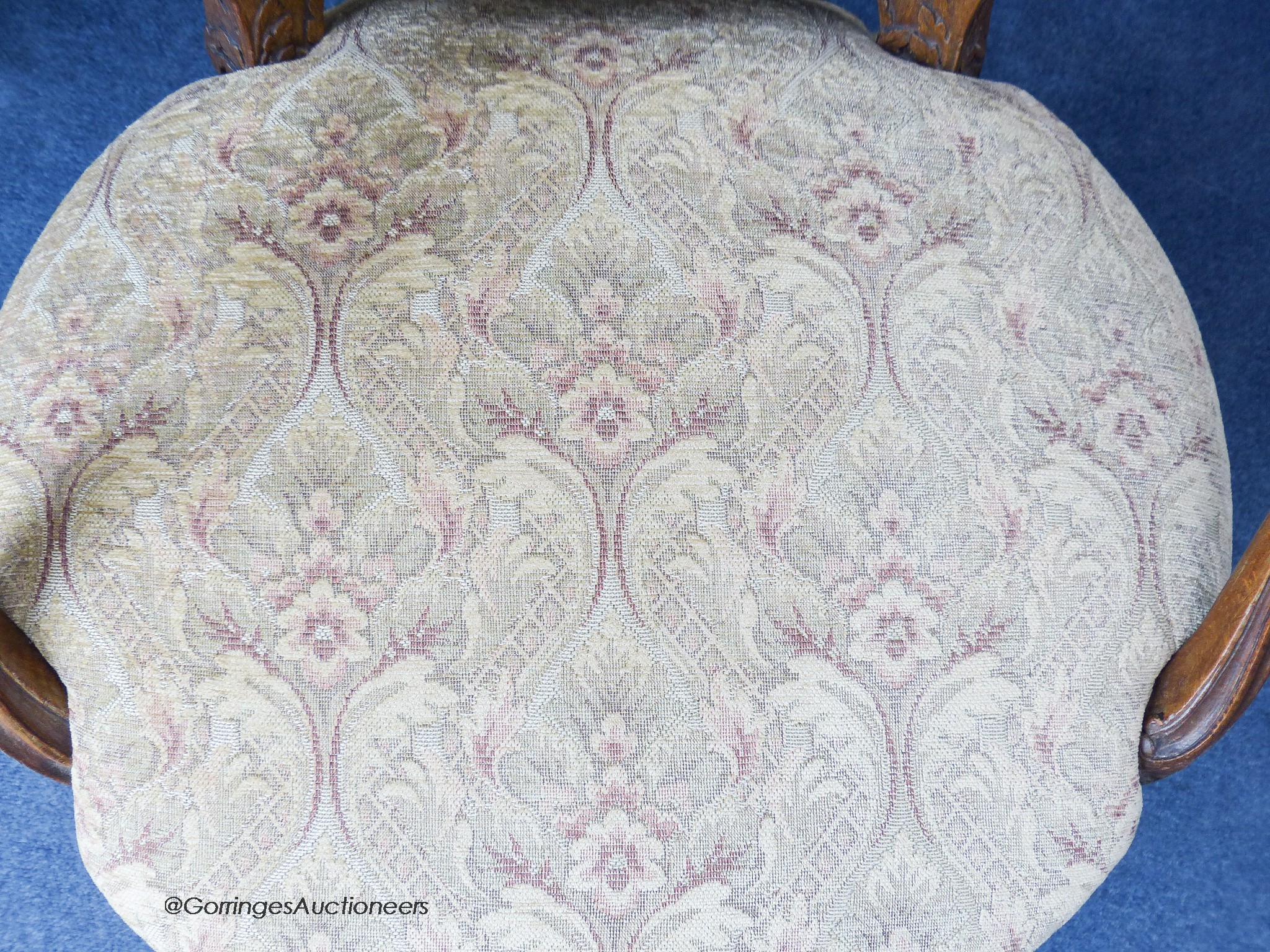 A pair of late 19th century french beech open armchairs.